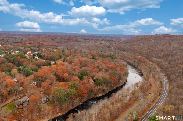a view of residential houses with tree