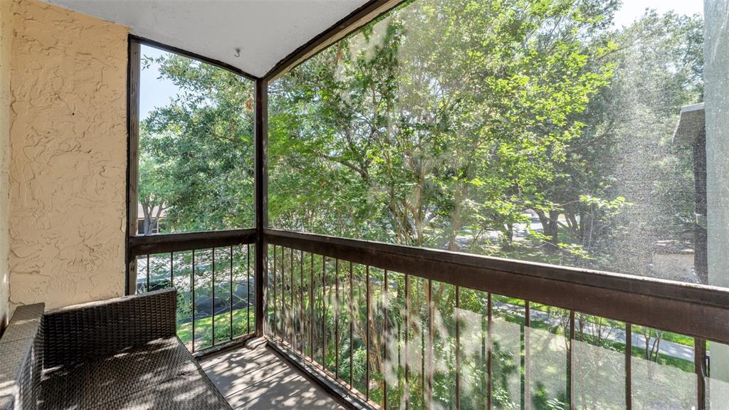 2025 Sylvester Road, Unit N305 Lakeland, FL 33803 - Photo 20 of 34 a view of a balcony with chair