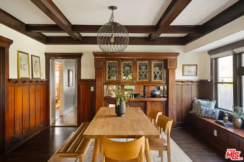view of a dining room with furniture window and wooden floor