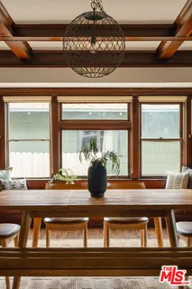 a kitchen with a stove and cabinets