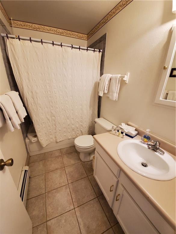 10000 Ryan Gulch Road, Unit 105 Wildernest, CO 80498 - Photo 12 of 24 a bathroom with a sink toilet and shower