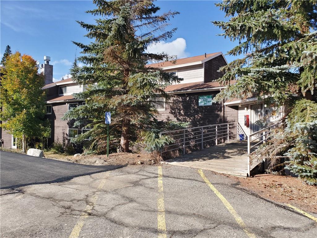 10000 Ryan Gulch Road, Unit 105 Wildernest, CO 80498 - Photo 22 of 24 a view of a house with potted plants