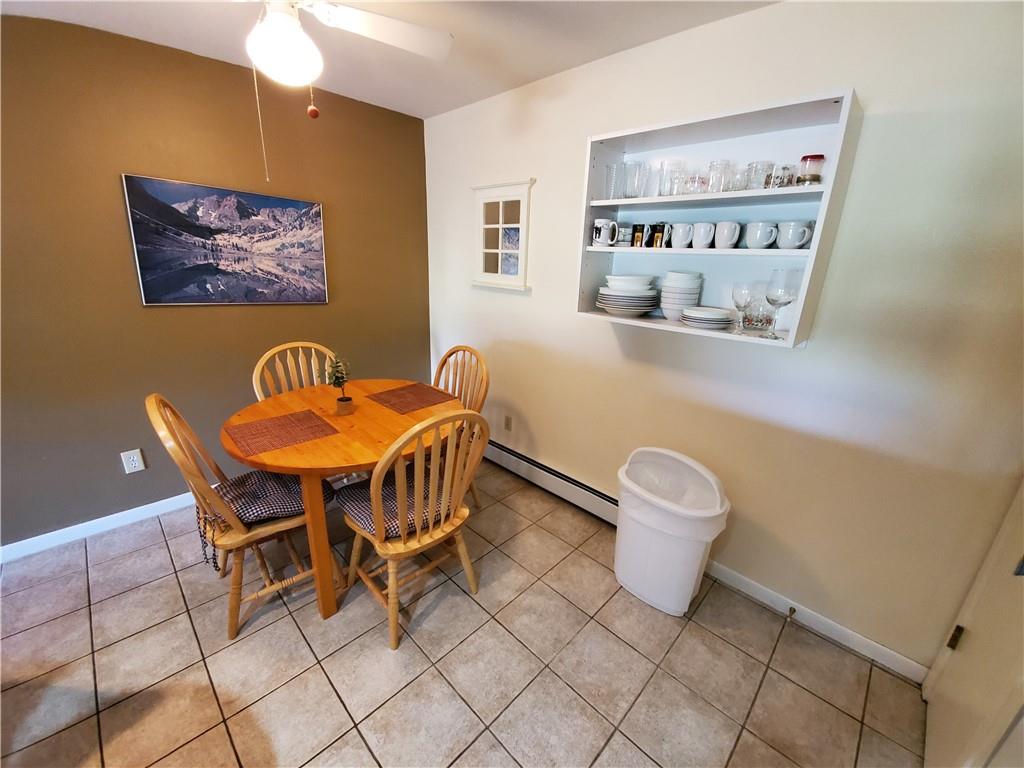 10000 Ryan Gulch Road, Unit 105 Wildernest, CO 80498 - Photo 8 of 24 a view of a dining room with furniture