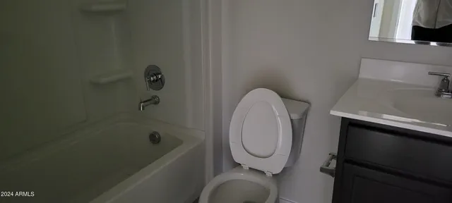 a kitchen with stainless steel appliances granite countertop a sink a microwave and stove