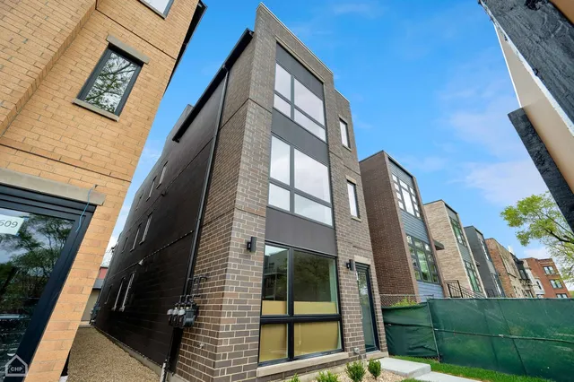 a view of a brick building with a door