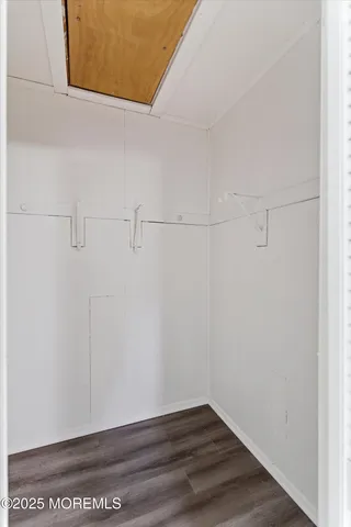 a view of small space with racks on the wall