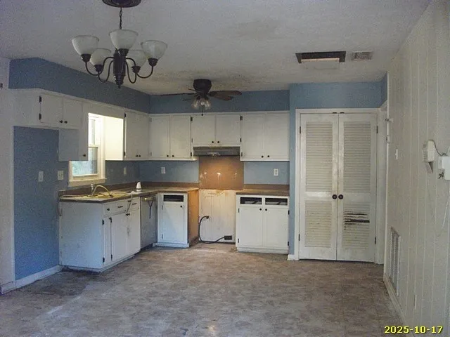 a brick house with a small yard