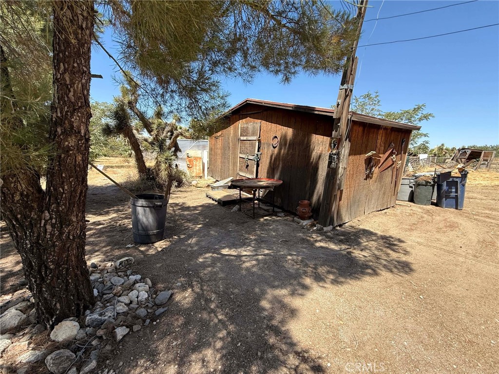 10623 Desert View Road Pinon Hills, CA 92372 - Photo 63 of 76 a view of a house with a snow in the background