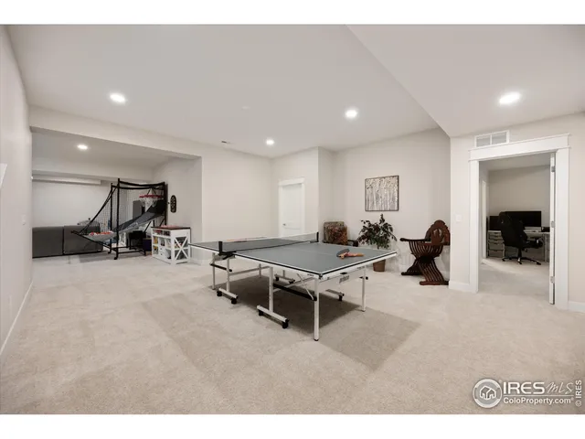 a living room with furniture gym equipment and a view of living room