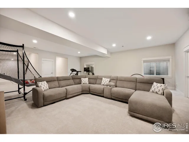 a living room with furniture and a couch