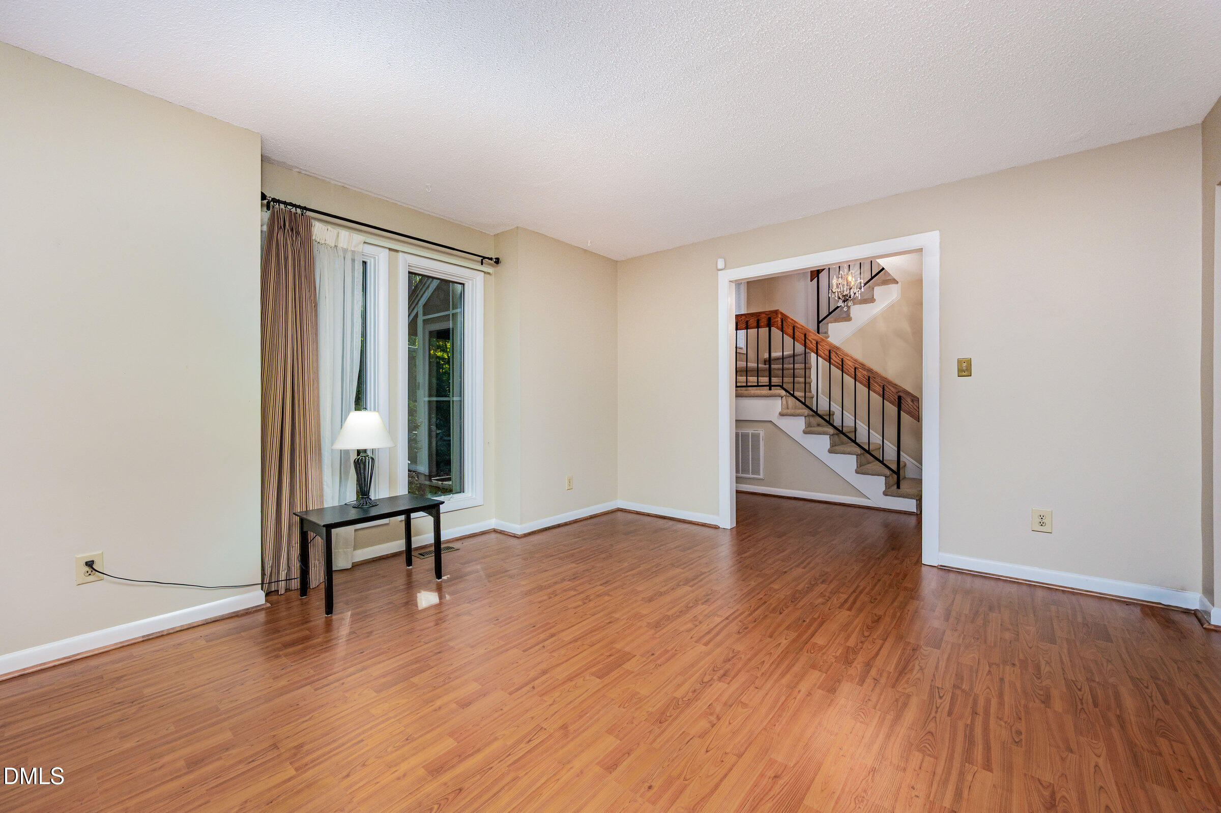 2900 Sylvania Drive Raleigh, NC 27607 - Photo 10 of 36 wooden floor in an empty room with a window