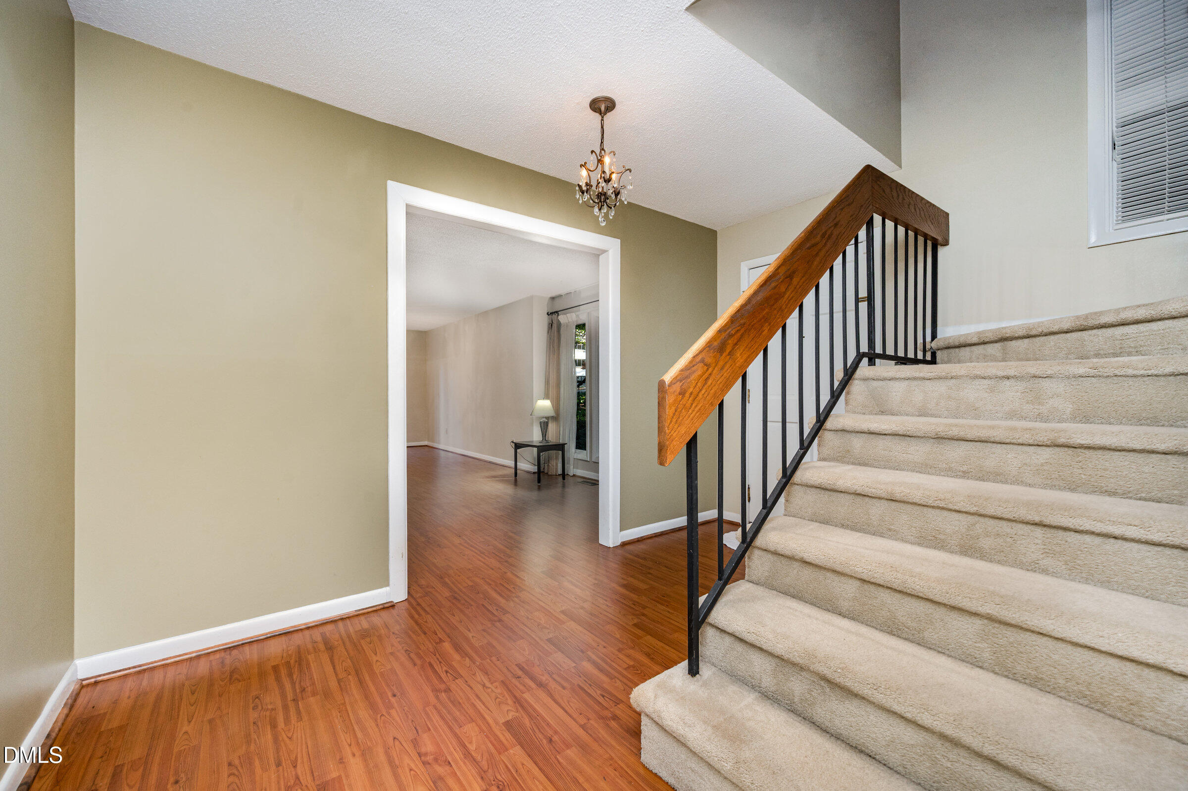 2900 Sylvania Drive Raleigh, NC 27607 - Photo 10 of 49 a view of entryway and hall with wooden floor