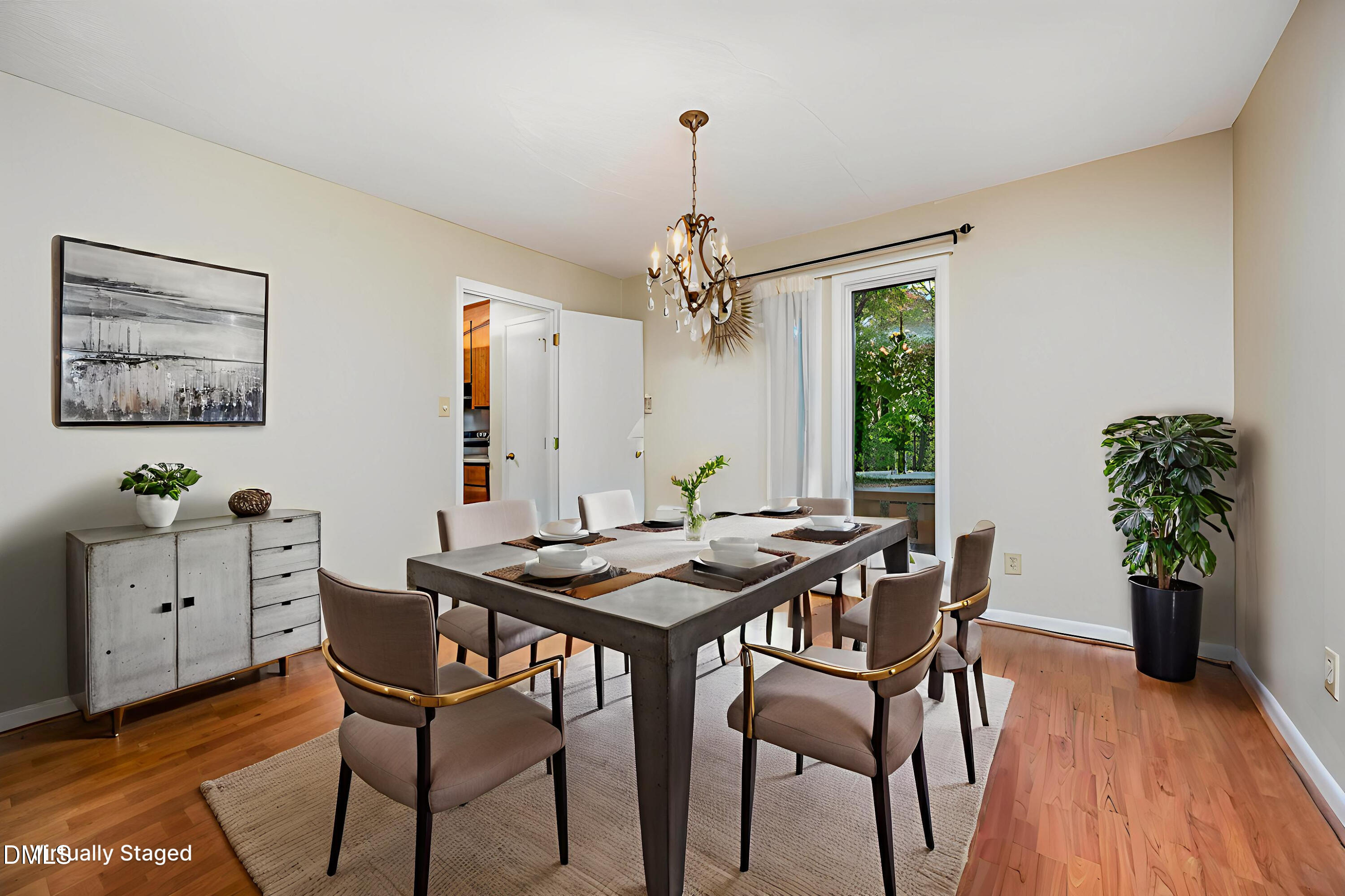 2900 Sylvania Drive Raleigh, NC 27607 - Photo 11 of 36 a view of a dining room with furniture window and wooden floor