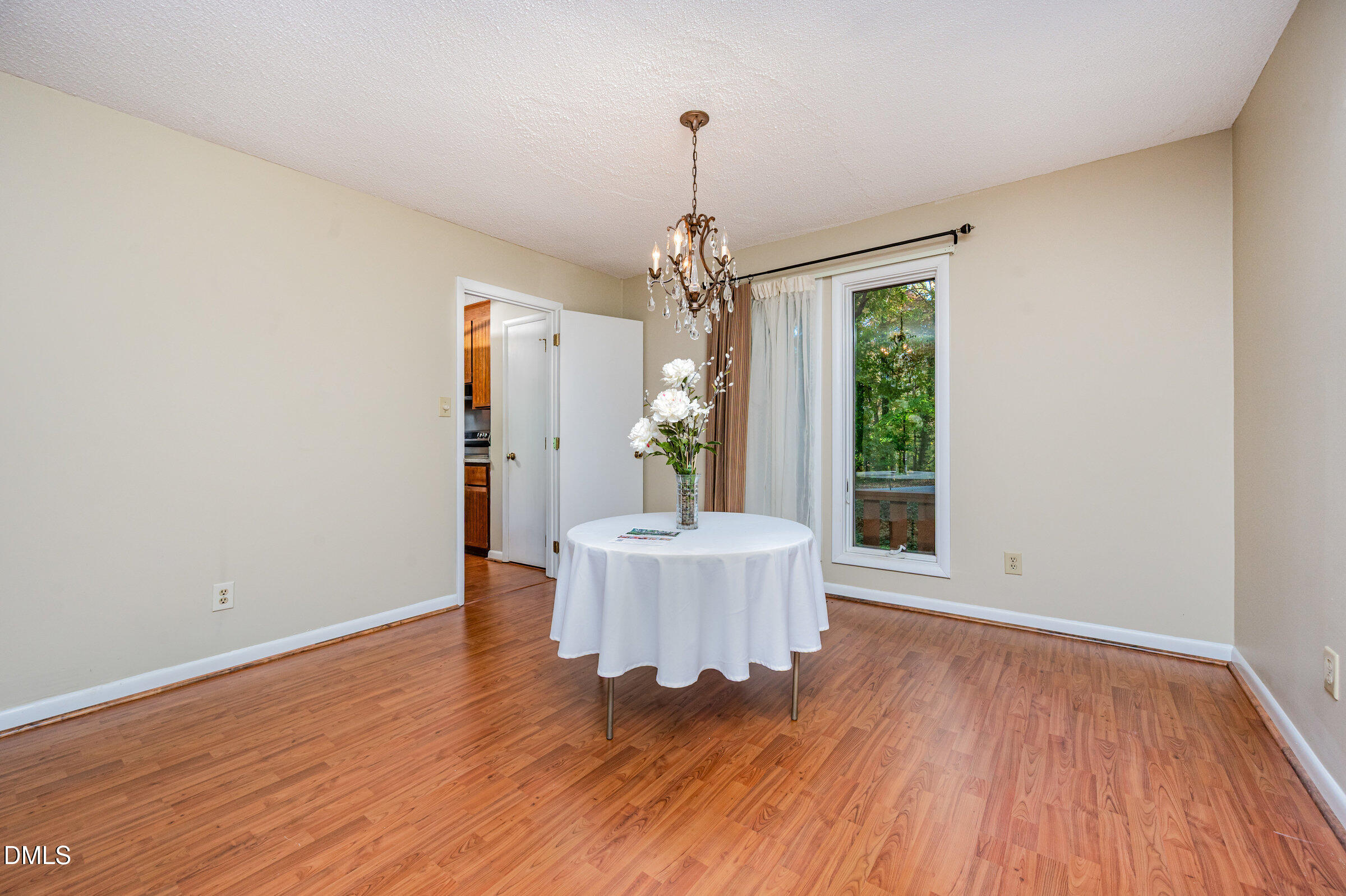 2900 Sylvania Drive Raleigh, NC 27607 - Photo 12 of 36 a view of a room with wooden floor and windows