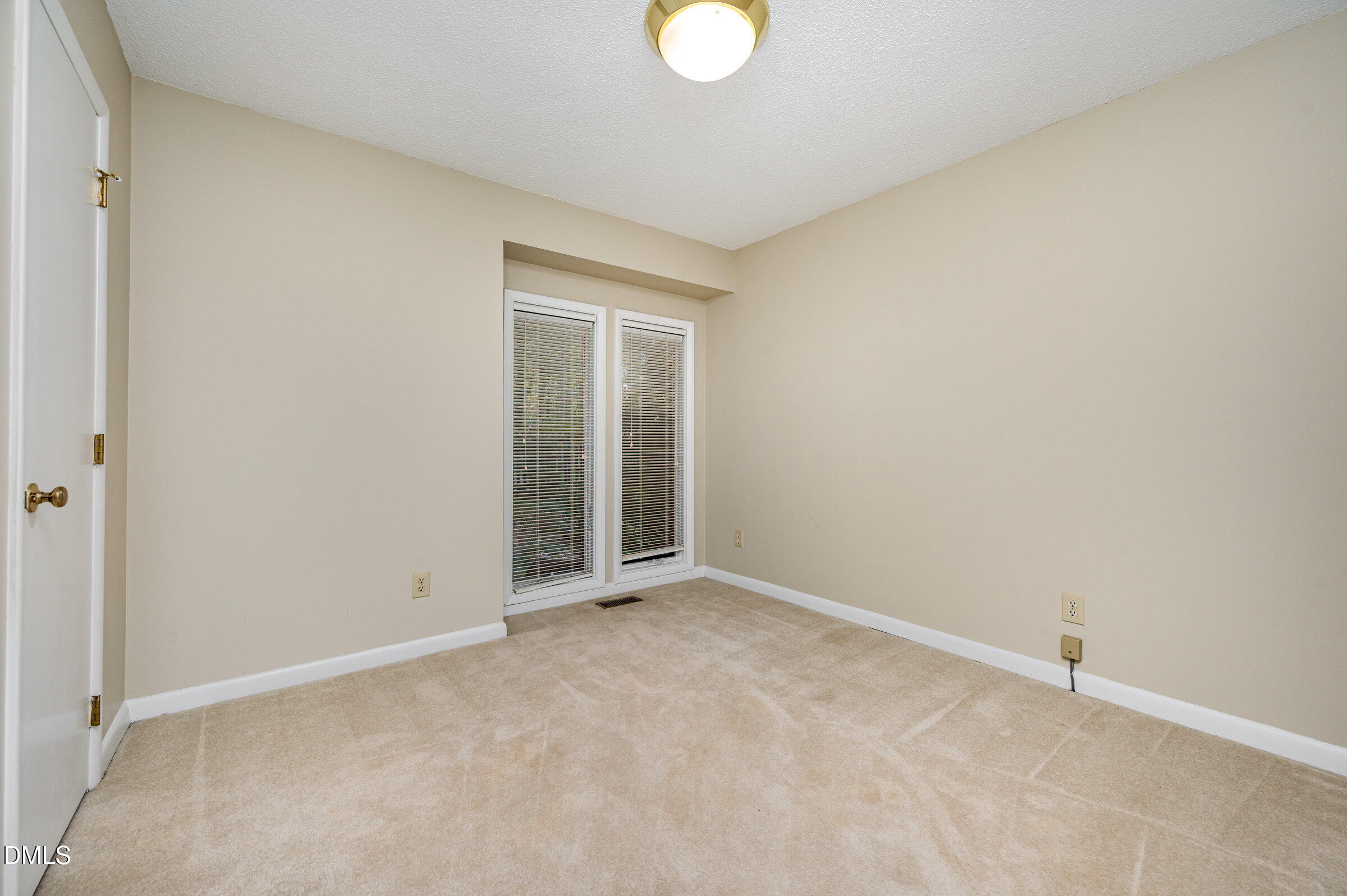 2900 Sylvania Drive Raleigh, NC 27607 - Photo 27 of 49 a view of an empty room with window