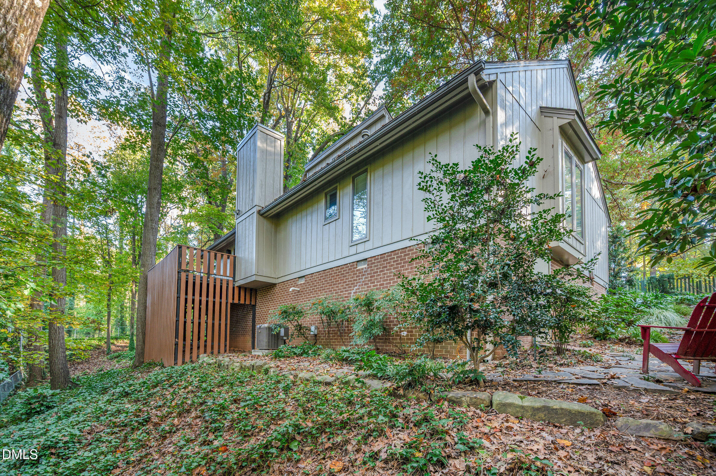 2900 Sylvania Drive Raleigh, NC 27607 - Photo 31 of 36 a backyard of a house with lots of green space