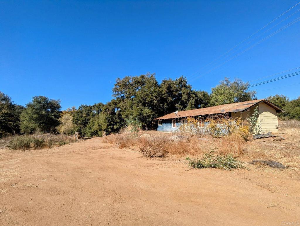 29851 Lilac Road Valley Center, CA 92082 - Photo 38 of 48 a backyard of a house with trees