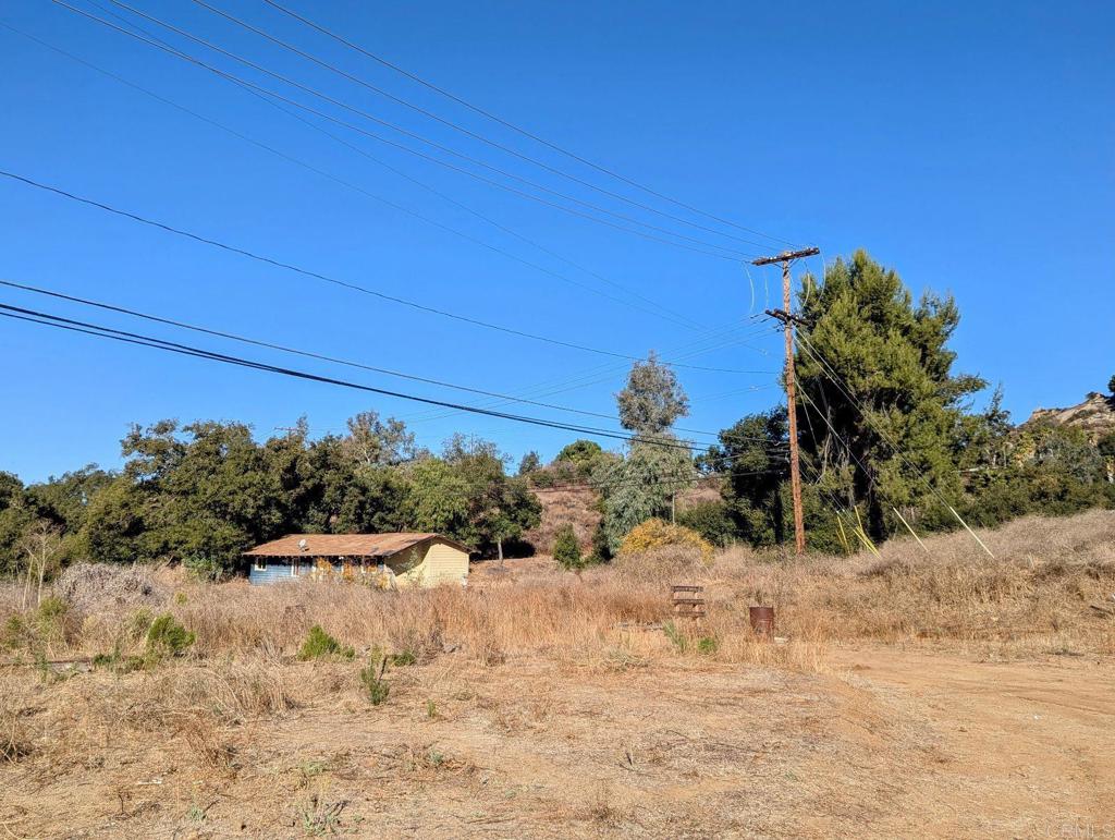 29851 Lilac Road Valley Center, CA 92082 - Photo 44 of 48 a view of a dry yard covered with snow in the background