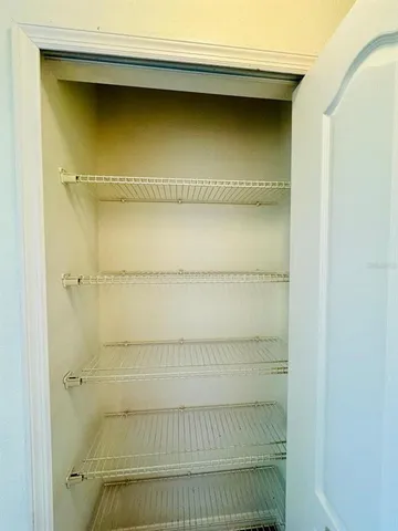 a view of a room with a window