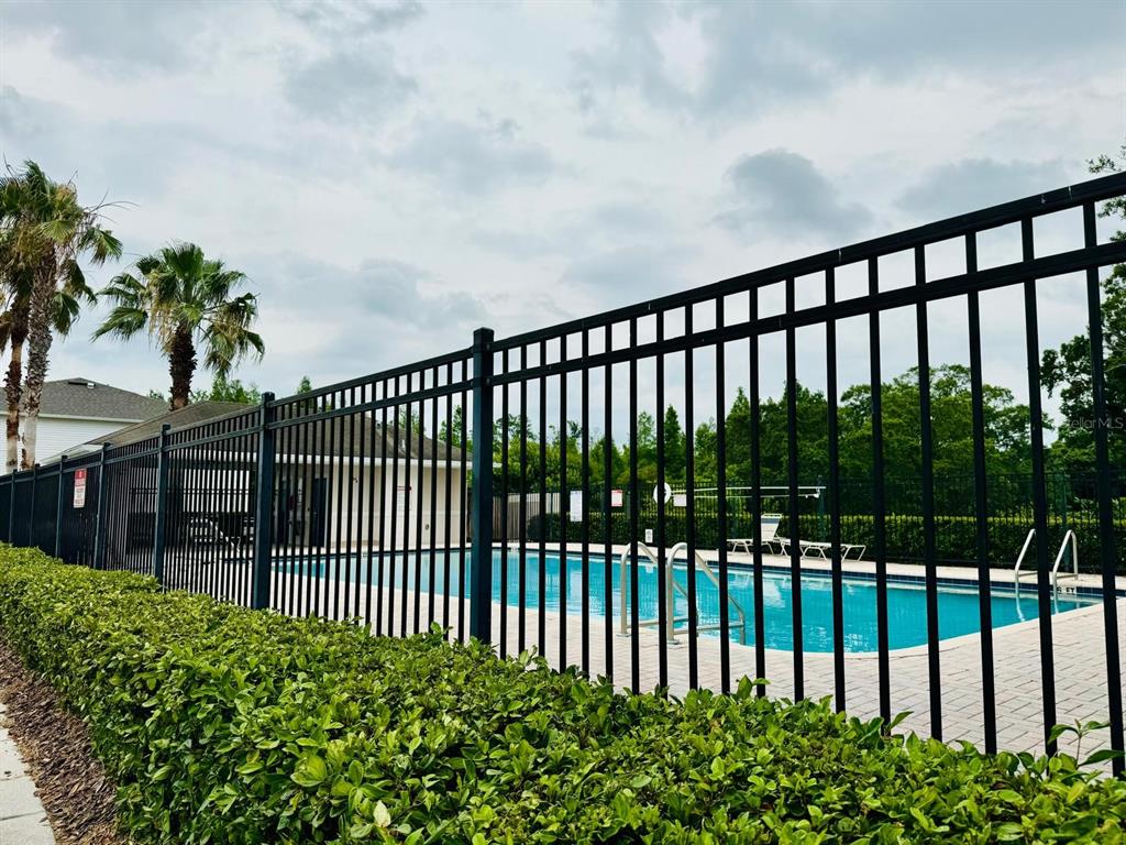 4518 Ashburn Square Drive Tampa, FL 33610 - Photo 2 of 34 a view of a balcony