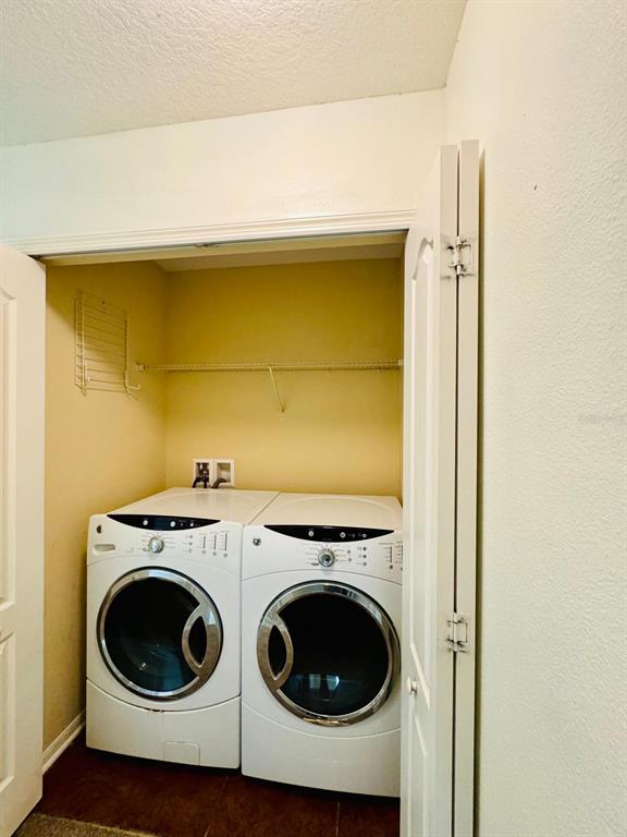 4518 Ashburn Square Drive Tampa, FL 33610 - Photo 21 of 34 a utility room with dryer and washer
