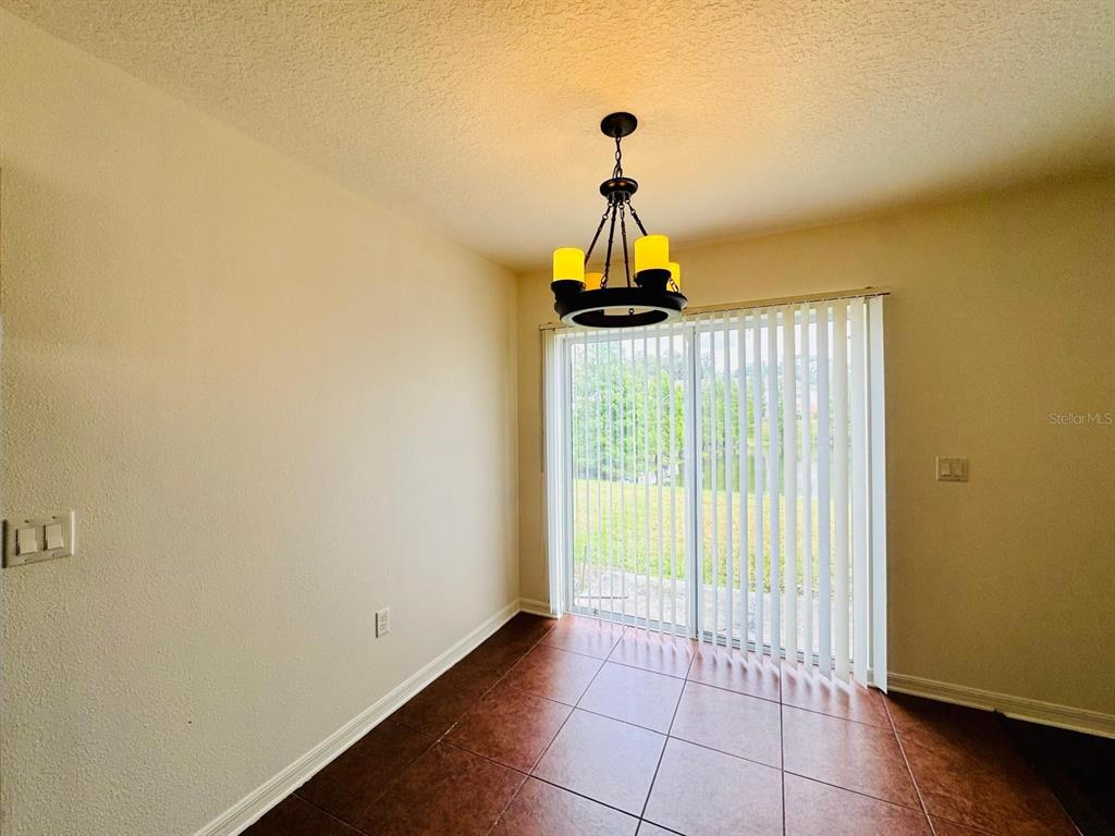 4518 Ashburn Square Drive Tampa, FL 33610 - Photo 23 of 34 a view of empty room with windows