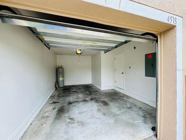 a bathroom with a sink toilet and a mirror
