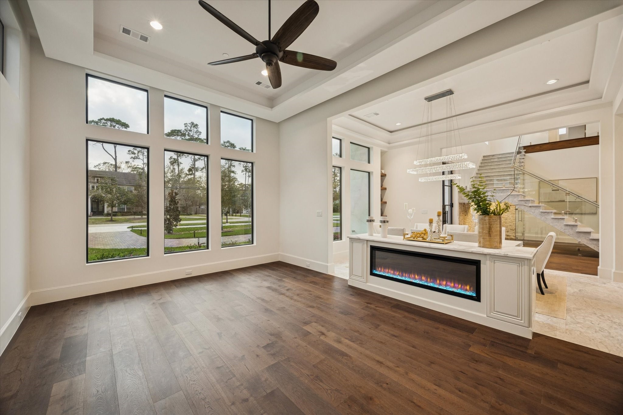 318 Knipp Road Houston, TX 77024 - Photo 12 of 48 a view of workspace with wooden floor and windows