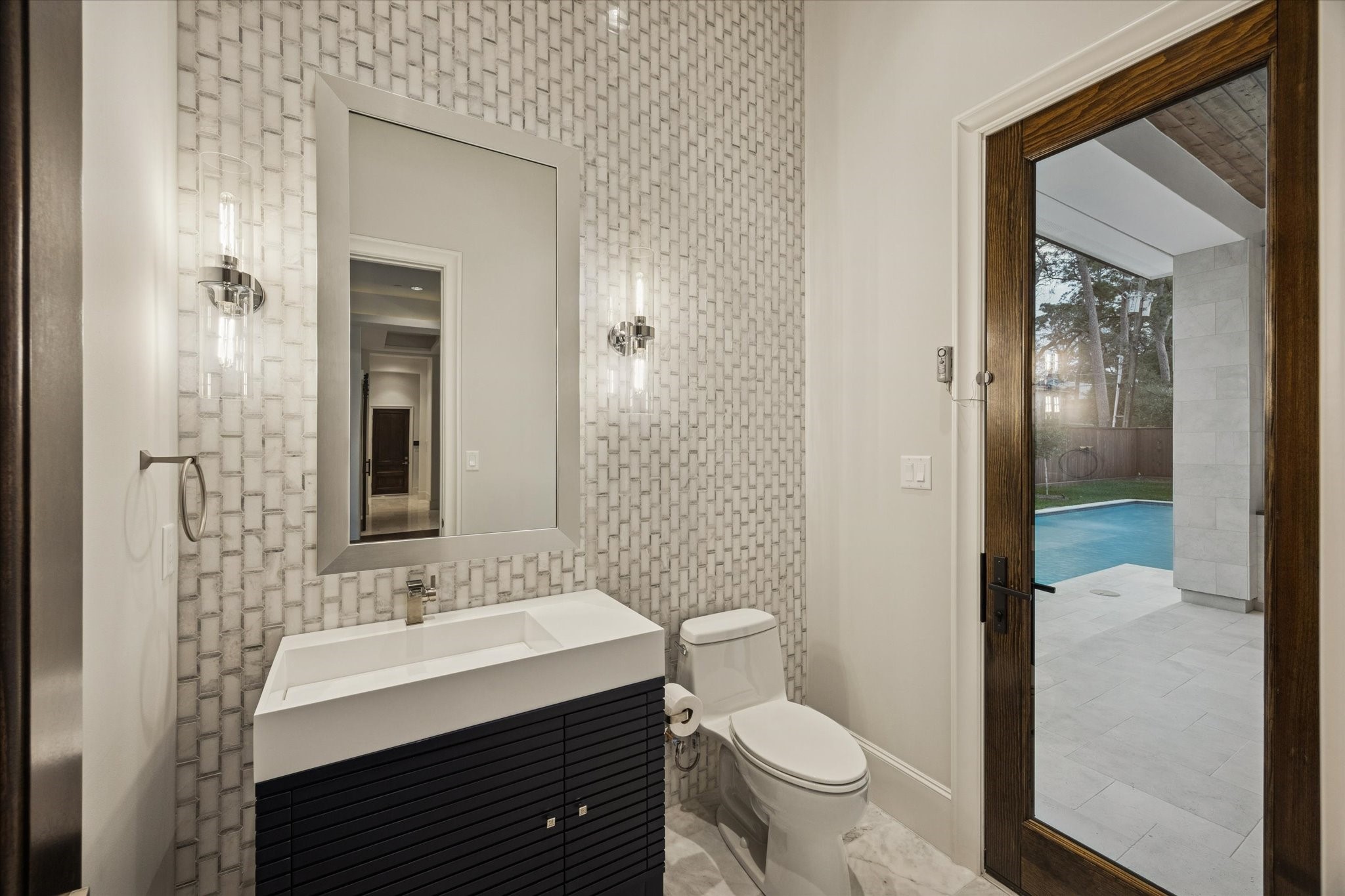 318 Knipp Road Houston, TX 77024 - Photo 15 of 48 a bathroom with a sink toilet and shower
