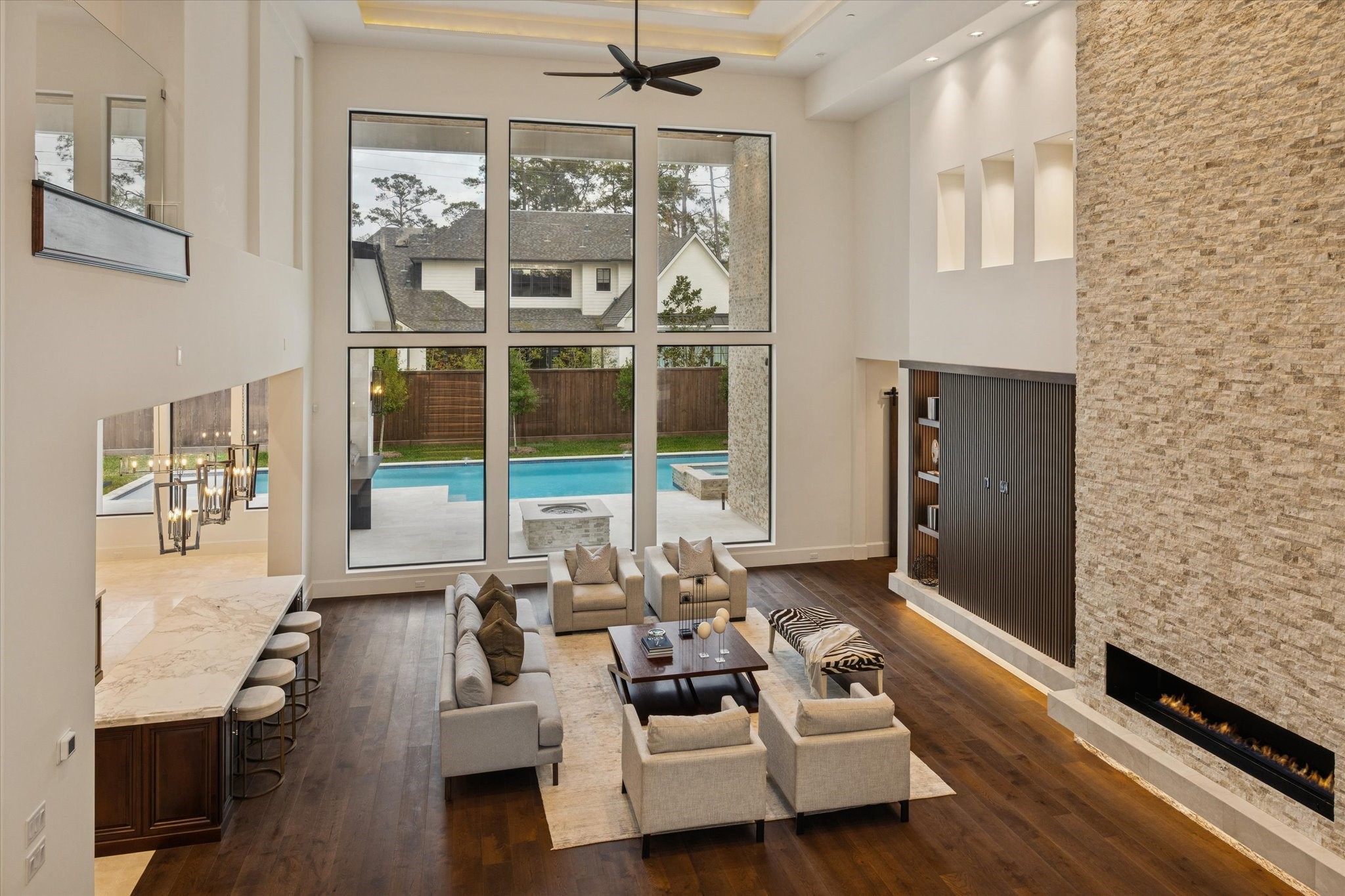 318 Knipp Road Houston, TX 77024 - Photo 3 of 48 a living room with furniture and a large window