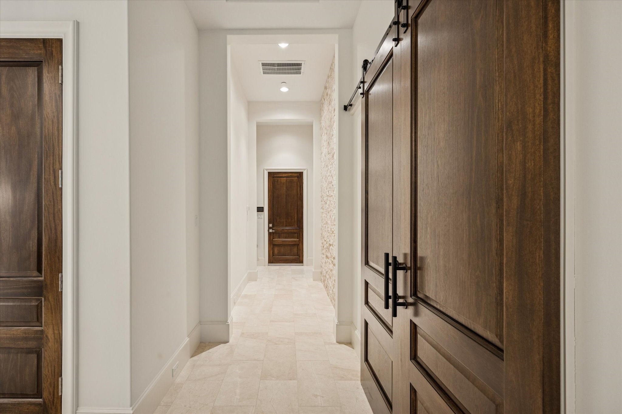 318 Knipp Road Houston, TX 77024 - Photo 38 of 48 a view of a hallway with wooden floor and staircase