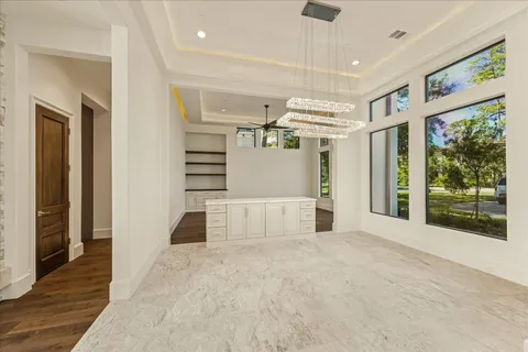 a view of a hallway with stairs