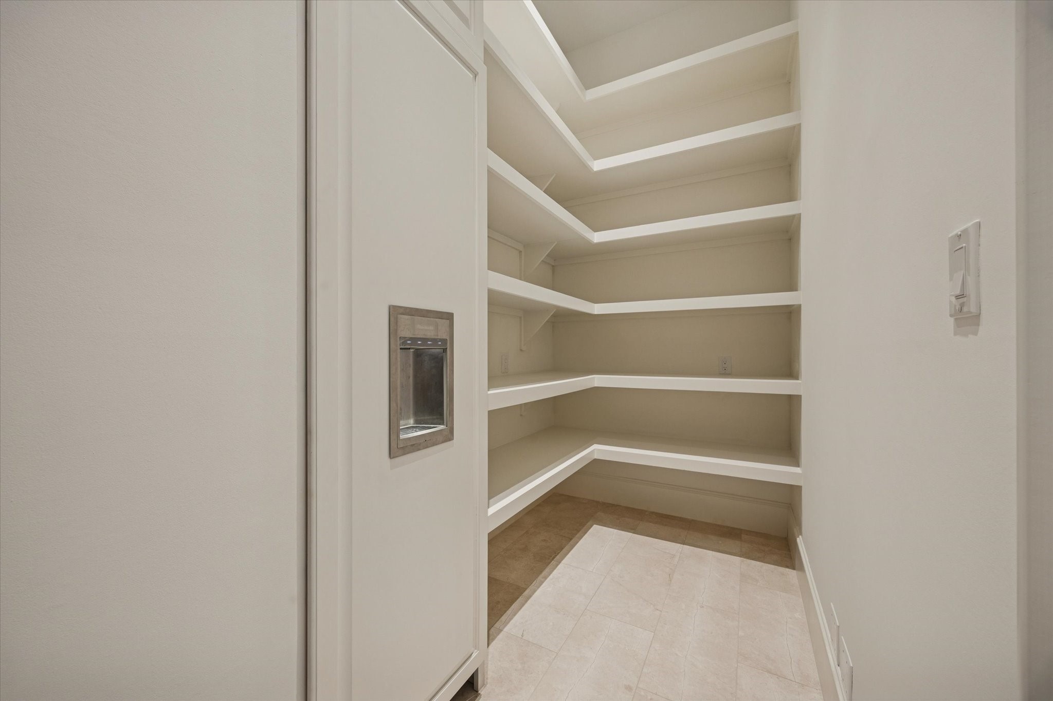 318 Knipp Road Houston, TX 77024 - Photo 9 of 48 a view of walk in closet with empty racks