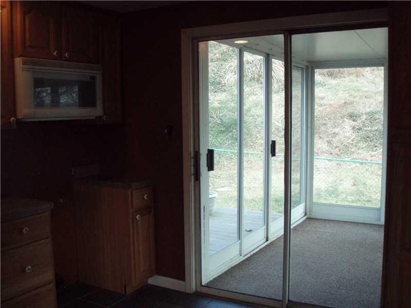 3193 Mellott Road Baldwin, PA 15227 - Photo 9 of 25 Kitchen. SLIDING GLASS DOOR FROM KITCHEN TO FLORIDA ROOM.