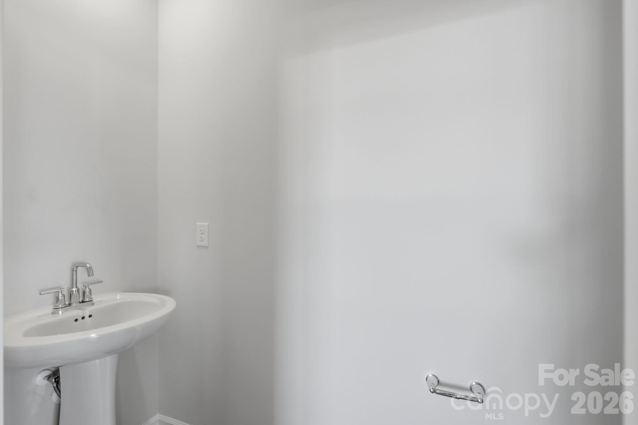 5475 Redbud Road, Unit 57 Lancaster, SC 29720 - Photo 26 of 30 a bathroom with a sink and mirror
