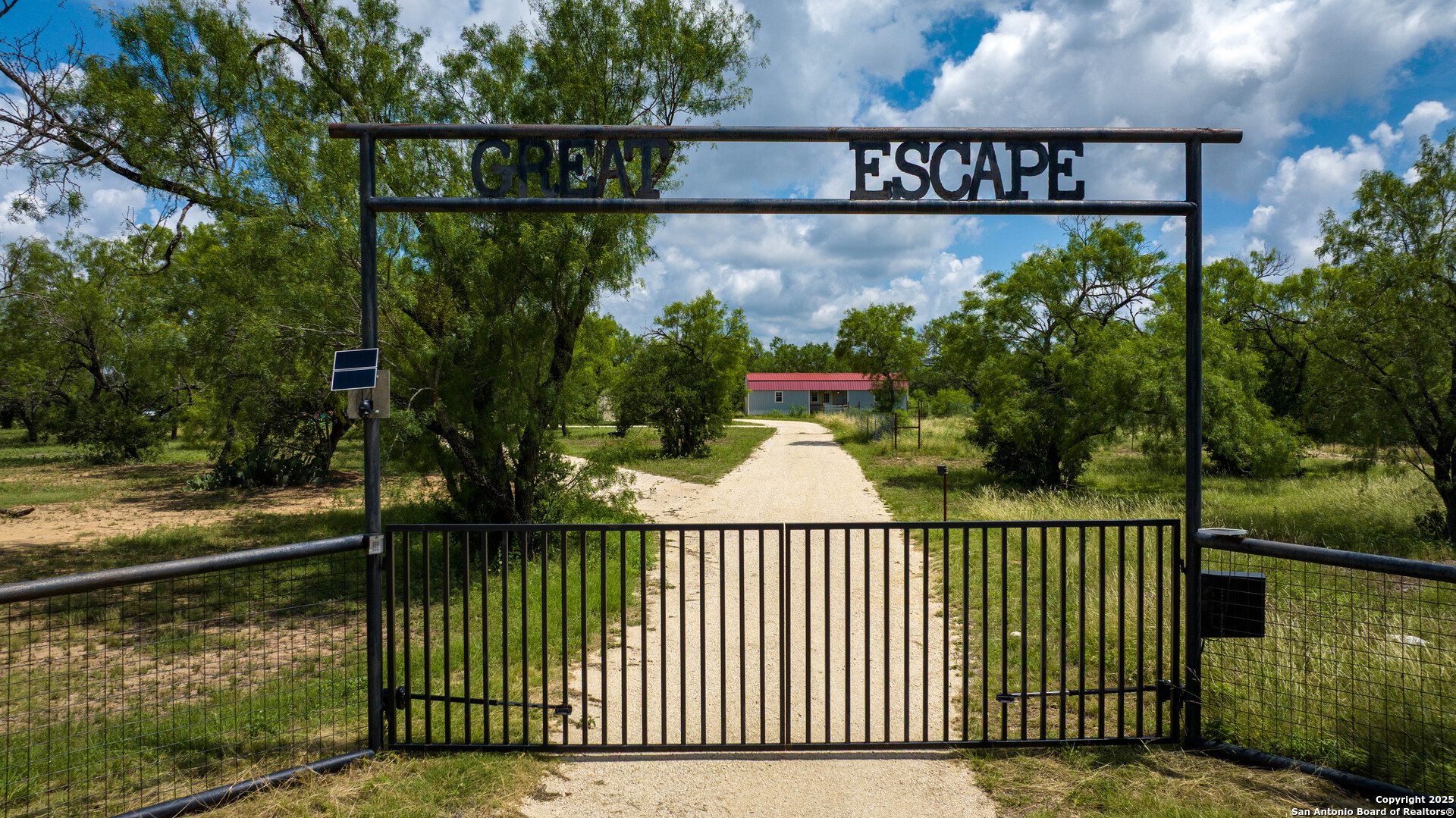 1231 B & R Road Vanderpool, TX 78885 - Photo 1 of 26 a view of a street sign on a deck