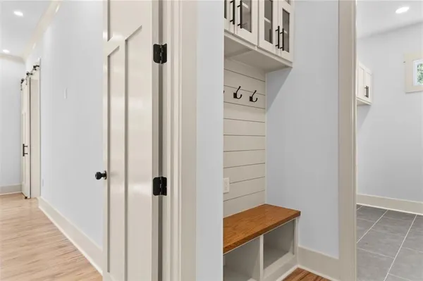 a living room with fireplace furniture and a flat screen tv