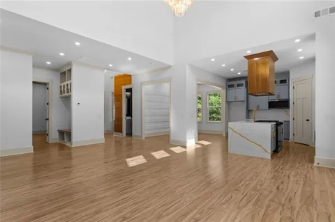 a kitchen with stainless steel appliances granite countertop a stove and a refrigerator