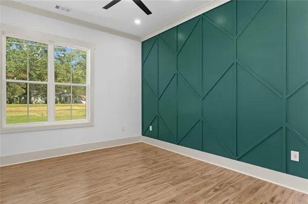 wooden floor and closet in a room