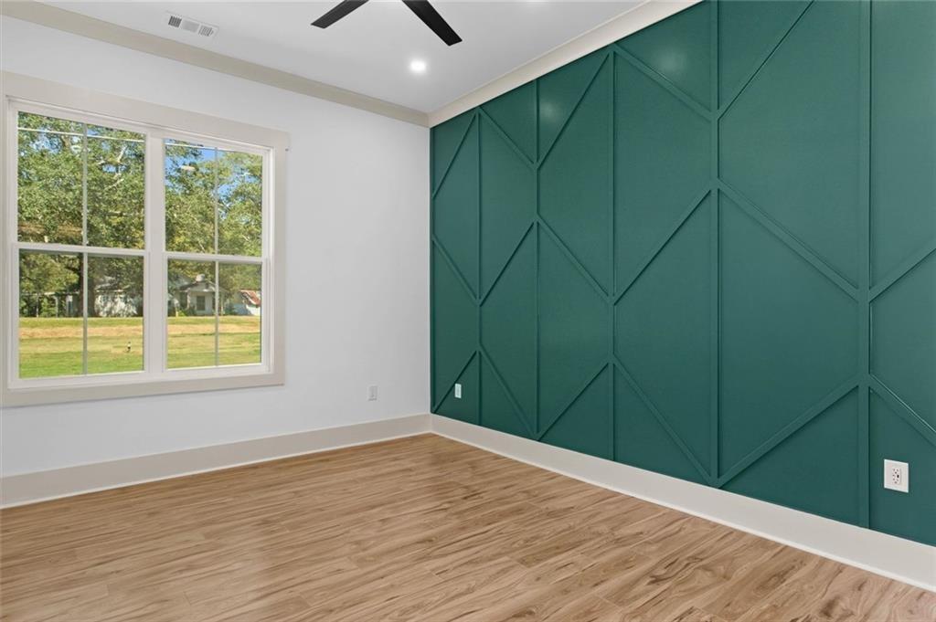 1960 Lost Mountain Road Powder Springs, GA 30127 - Photo 42 of 56 wooden floor in an empty room with a window