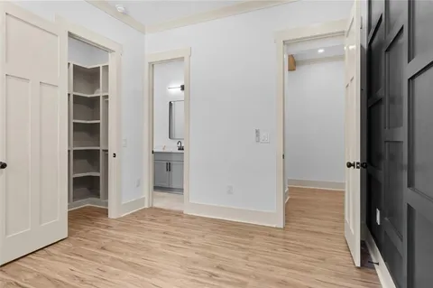 a view of a hardwood & utility room