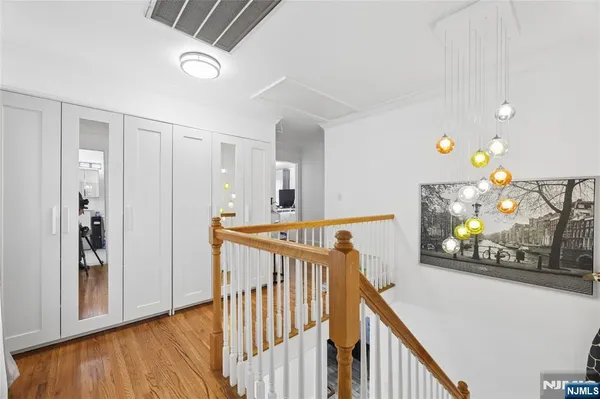 a view of a backyard with large trees