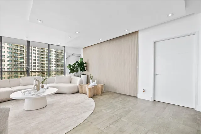a living room with furniture and window