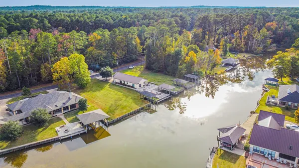 an aerial view of a house with a swimming pool