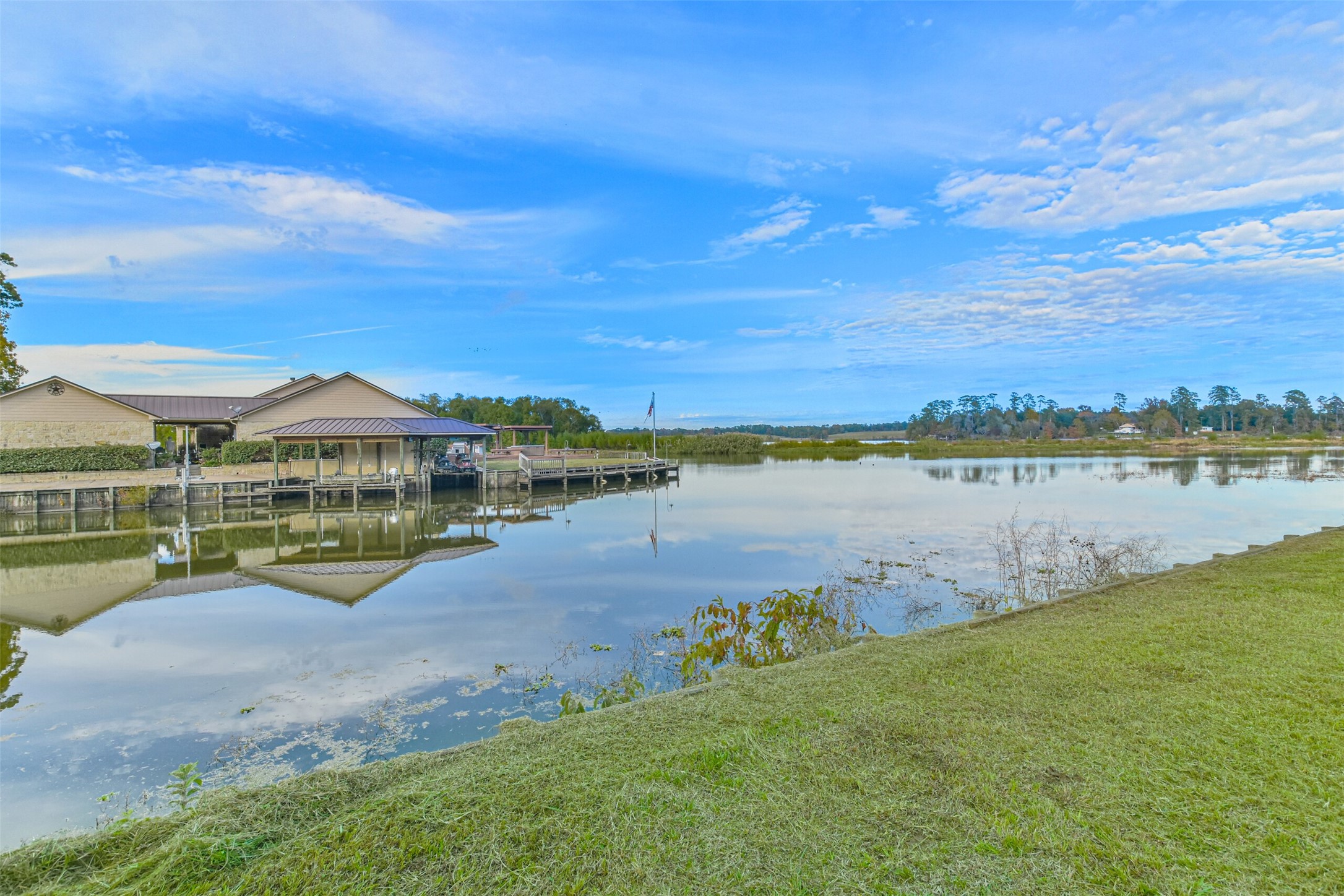 0 Lakeway Drive Trinity, TX 75862 - Photo 20 of 21 a view of a lake with a big yard