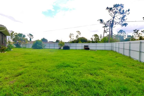 a view of a backyard with a garden