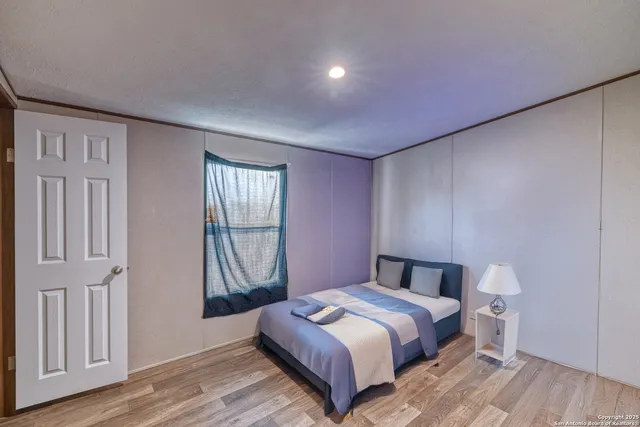 a view of a house with a street