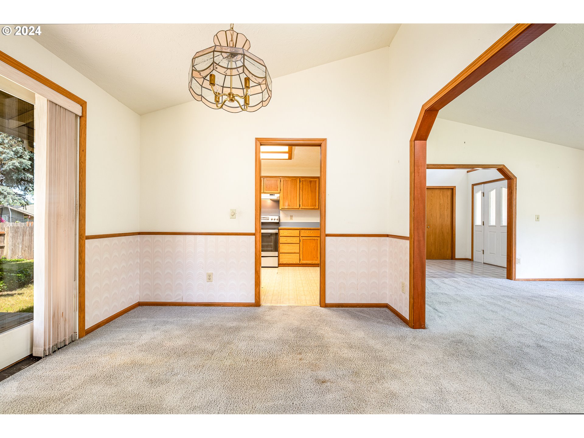 378 70th Street Springfield, OR 97478 - Photo 9 of 39 a view of an empty room with a window