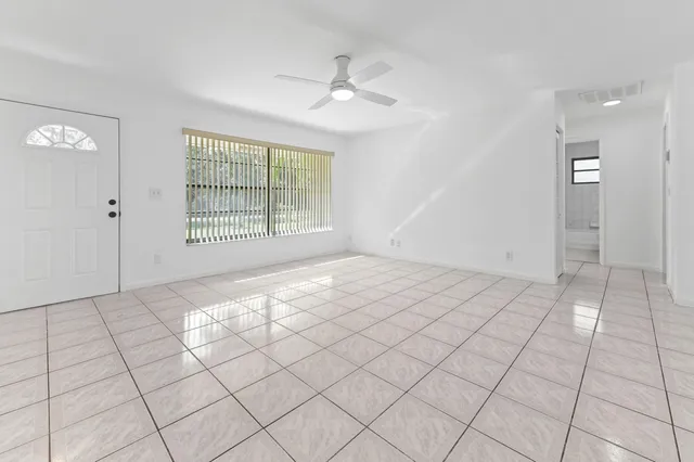 a view of an empty room and window