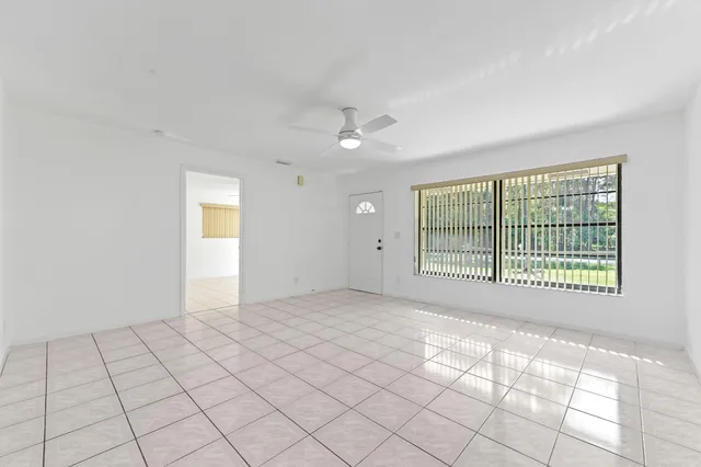 a view of an empty room and window